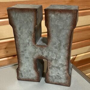 Galvanized “H” Sign